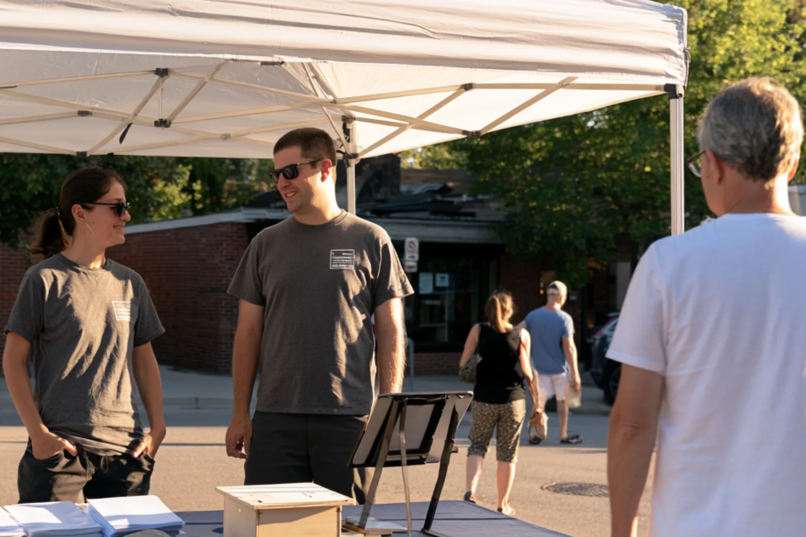 A community fundraising kiosk at an outdoor event